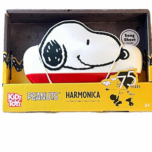 Peanuts harmonica toy in packaging with Snoopy design