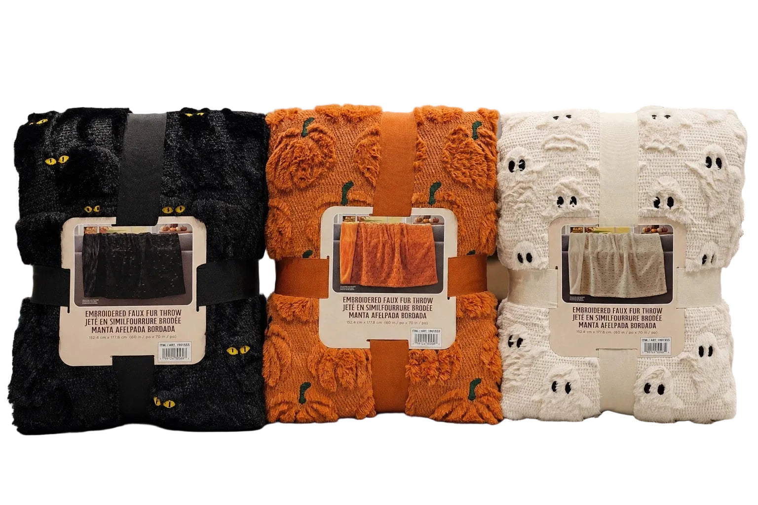 Three folded plush throw blankets with Halloween-themed textures are displayed side by side on a light surface. The left blanket is black with small yellow cat-eye details.