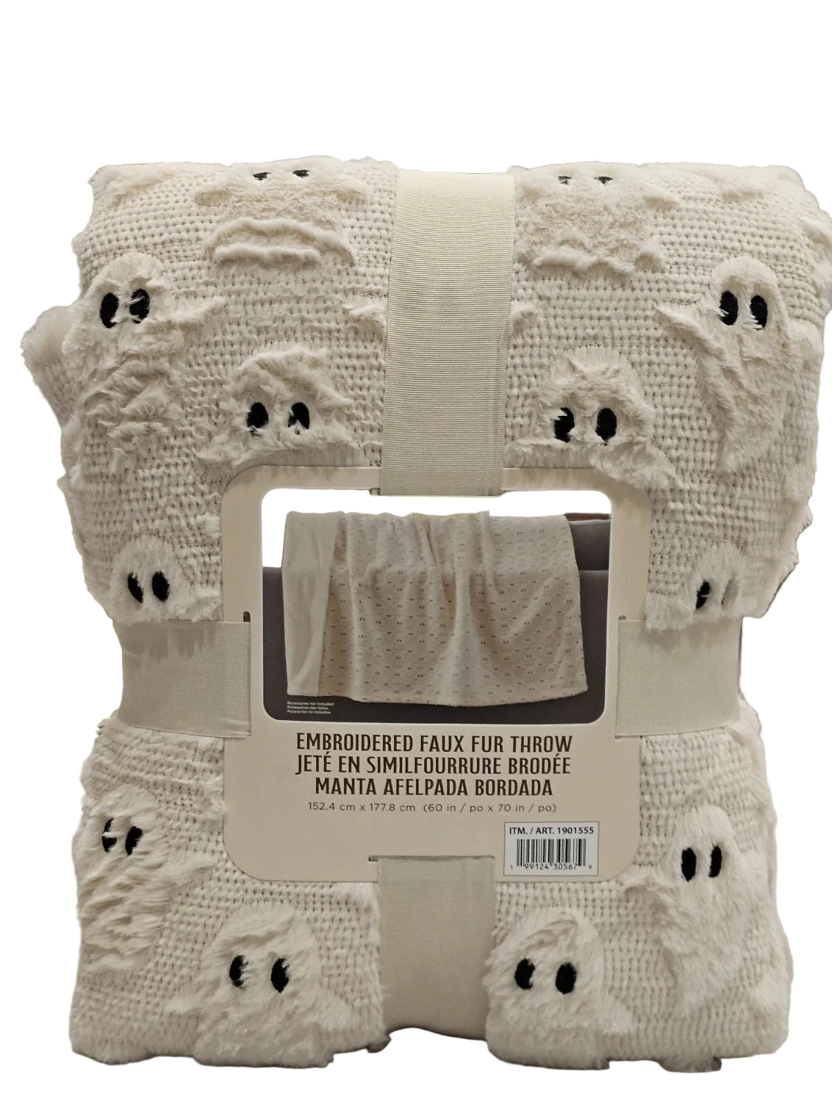 An off-white/cream embroidered faux fur throw blanket with ghost face details, packaged with a cardboard label and ribbon.