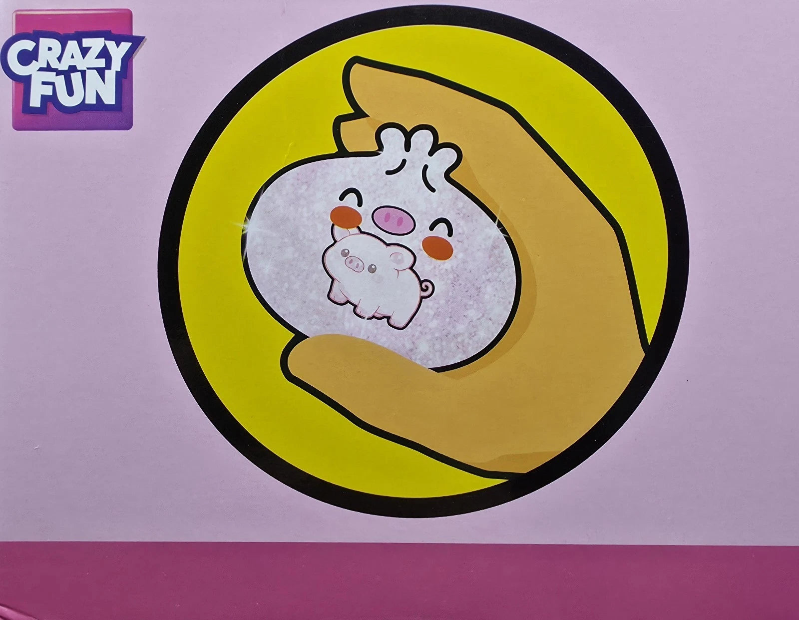 A sticker or decal featuring a cute cartoon character, shown applied to a pink surface. The sticker depicts a small white character with pink cheeks and a pink nose, nestled inside a yellow circle with a black border, held by a tan hand.