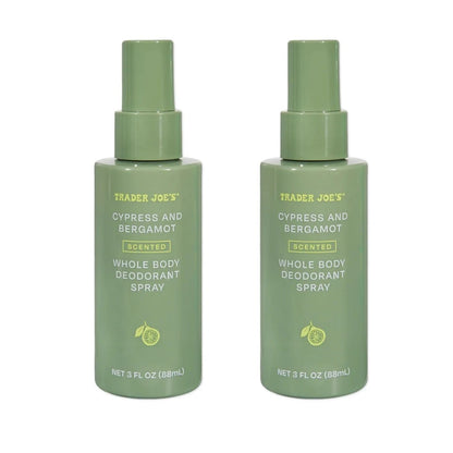 Two green spray bottles of Trader Joe's Cypress and Bergamot Scented Whole Body Deodorant Spray on a white background.