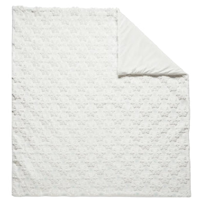 Holiday embroidered faux fur throw, Snowflake style, laid flat with corner folded