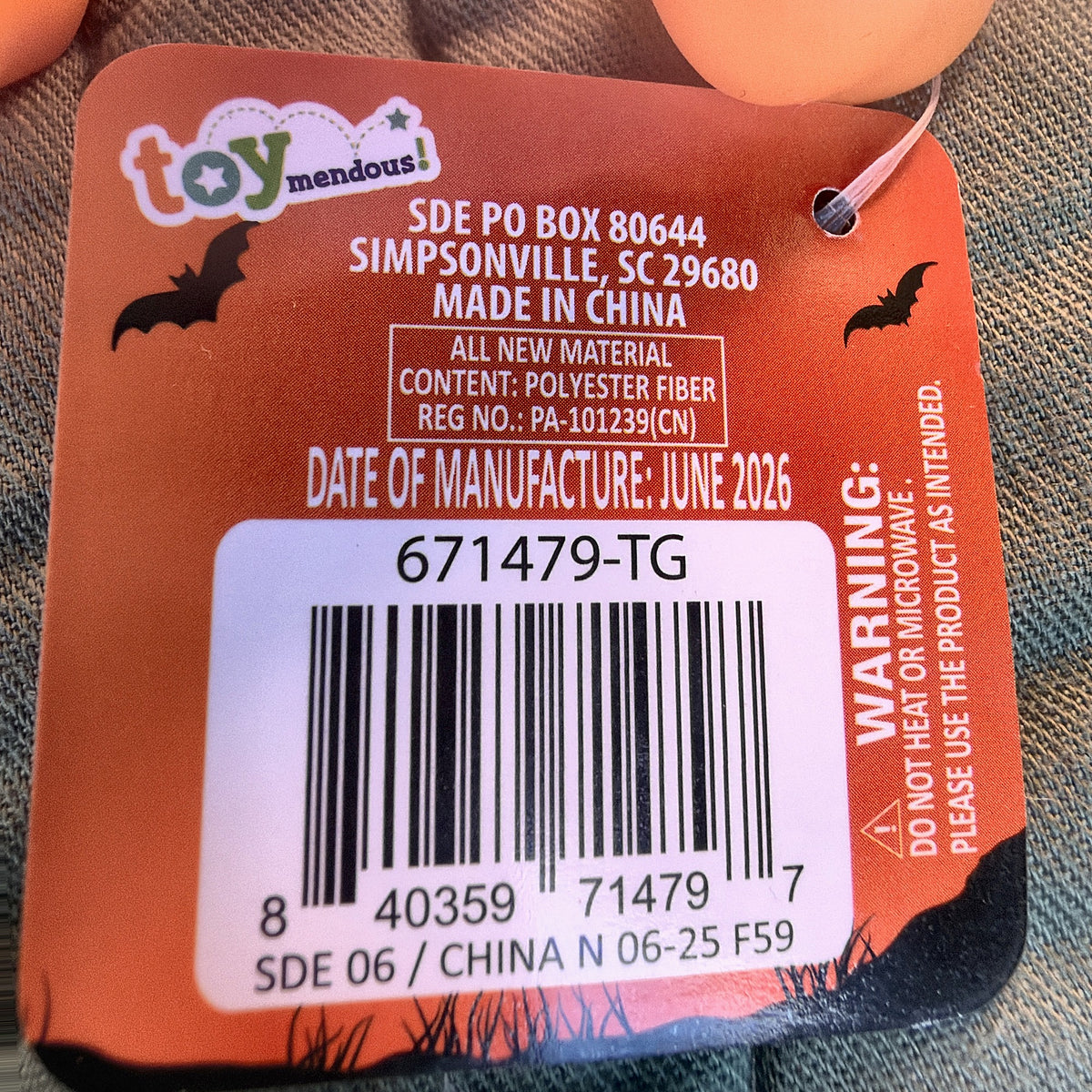 ToyMendous hang tag back with item 671479-TG, UPC 840359714797 barcode and safety warning