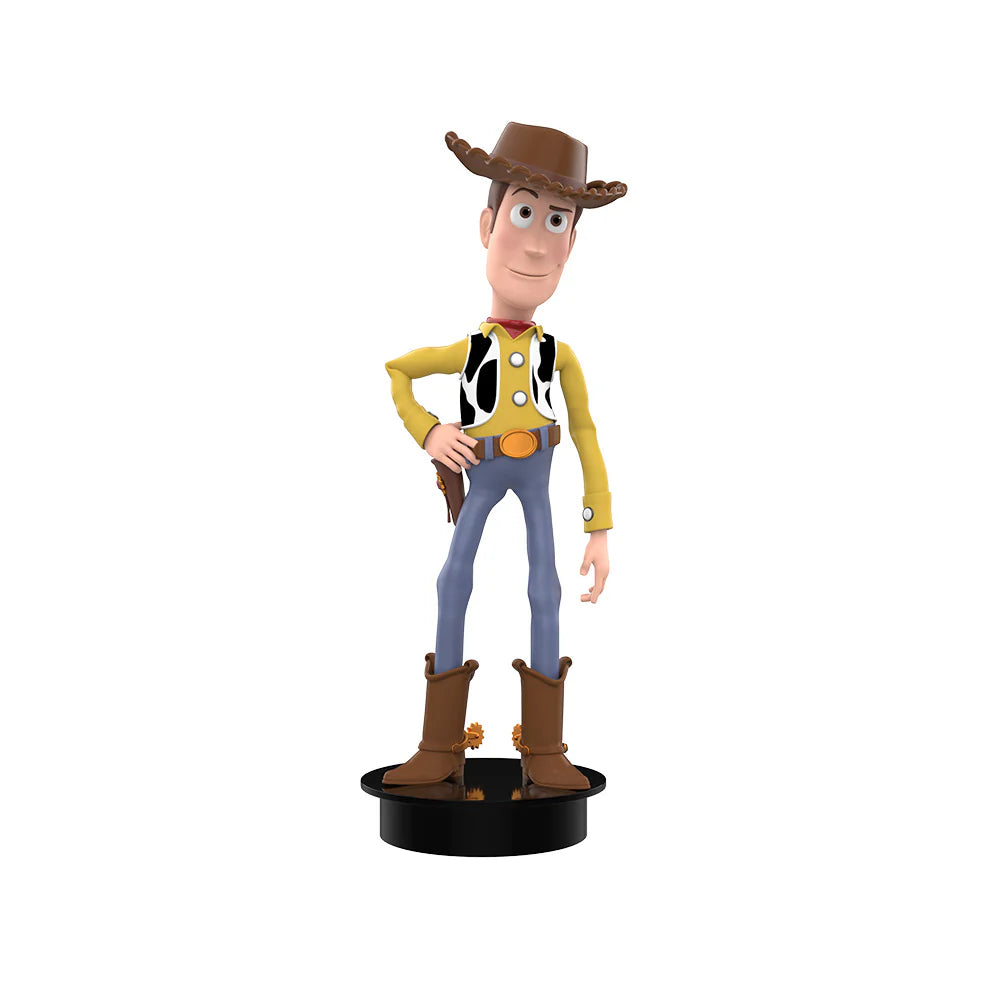 Toy Story figure of Woody on a white background