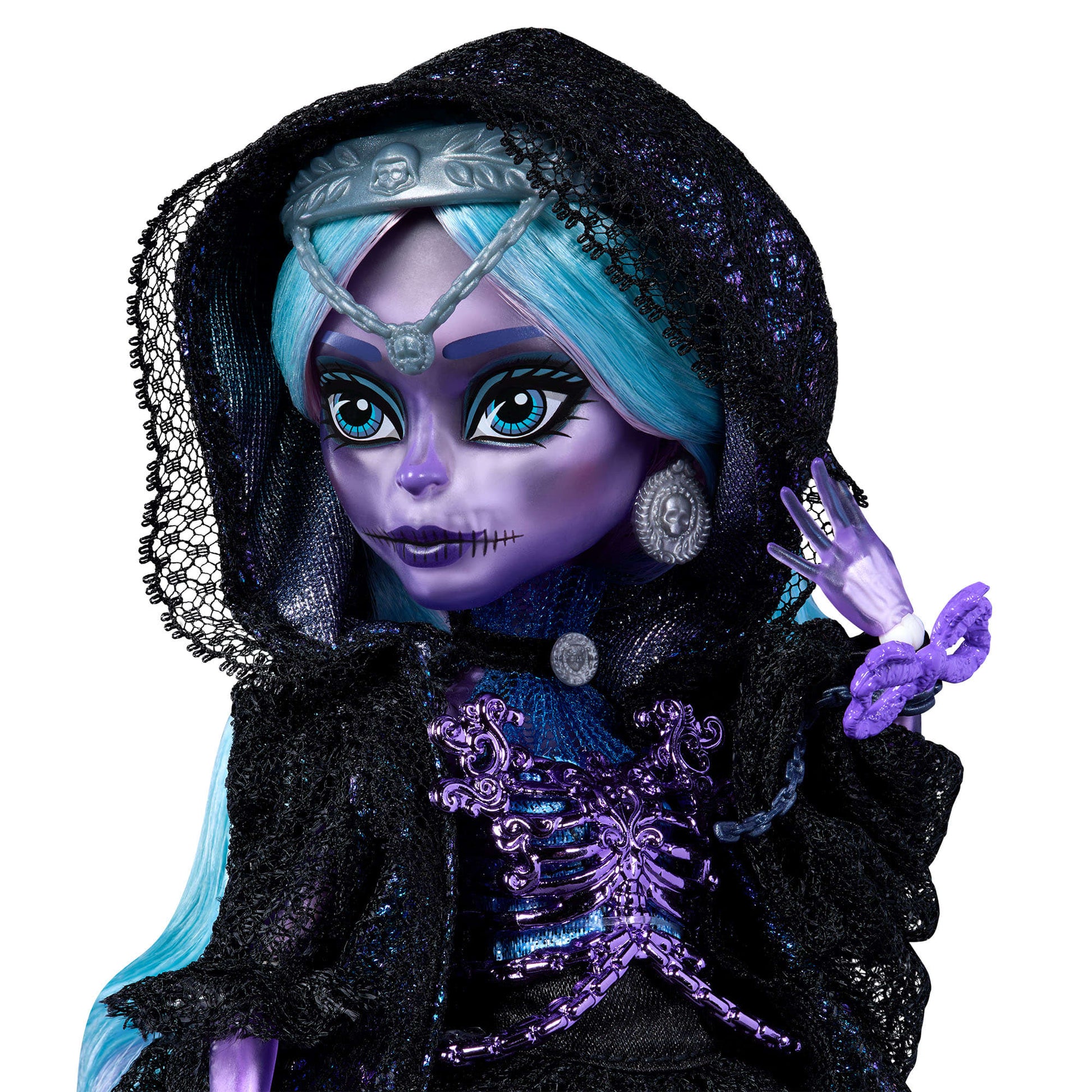 Vampire-themed doll with blue hair and purple accents on a white background